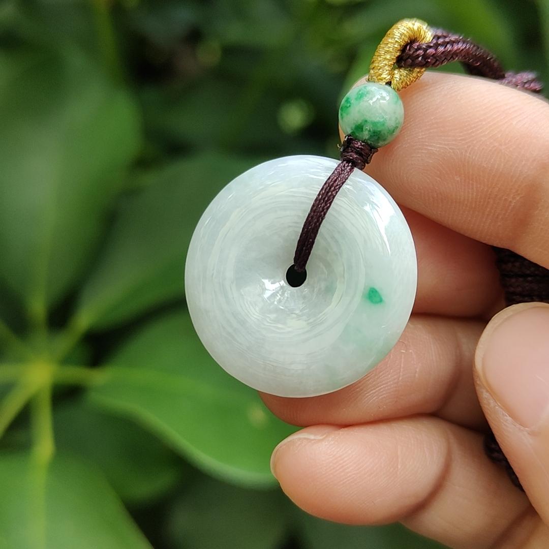 Light Green Hue with a Green Patch crafted as Donut Shape Natural Type A Jadeite-Jade Pendant, certificate weighs 5.61 grams, measurement 24.8 * 4.5 mm (pendant304) Yi Pin Qian Jadeites Jade Jewelry ~Your Precious Quintessential ~ Singapore
