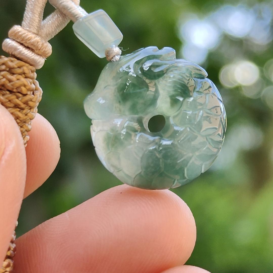 #Sold - High Quality Green with Green Patches Natural Type A Jadeite Jade crafted with shape of Donut with Baby Dragon as Pendant, QIC approved labs certificate weigh 4.11 grams, measurement 17.2 * 16.3 * 5.1 mm (pendant242)