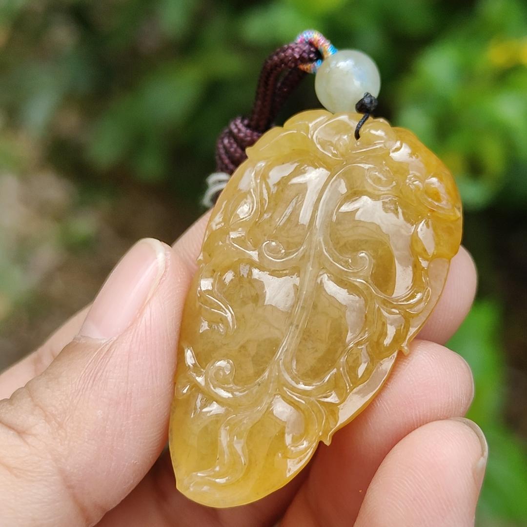 Very fine and old full Yellow Natural Type A Jadeite Pendant carved as a leave and a Mythical Beast on it with certificate weight 16.02 grams, 44 * 26 * 10 mm meaning Good luck and auspiciousness (pendant107) Yi Pin Qian