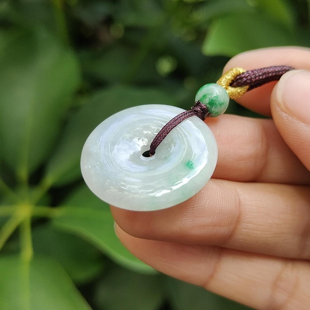 Light Green Hue with a Green Patch crafted as Donut Shape Natural Type A Jadeite-Jade Pendant, certificate weighs 5.61 grams, measurement 24.8 * 4.5 mm (pendant304) Yi Pin Qian Jadeites Jade Jewelry ~Your Precious Quintessential ~ Singapore