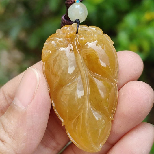 Very fine and old full Yellow Natural Type A Jadeite Pendant carved as a leave and a Mythical Beast on it with certificate weight 16.02 grams, 44 * 26 * 10 mm meaning Good luck and auspiciousness (pendant107) Yi Pin Qian