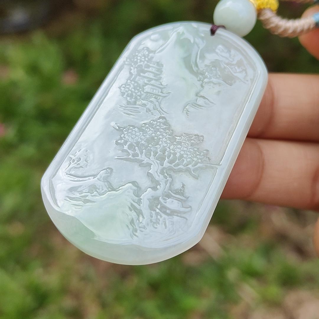 Quality Semi Icy White and Light Green Patches Natural Type A Jadeite Jade crafted with sceneries as pendant with QIC labs approved certificate weigh 24.89 grams, measurement 54 * 32 * 4.5 mm (pendant227) Yi Pin Qian