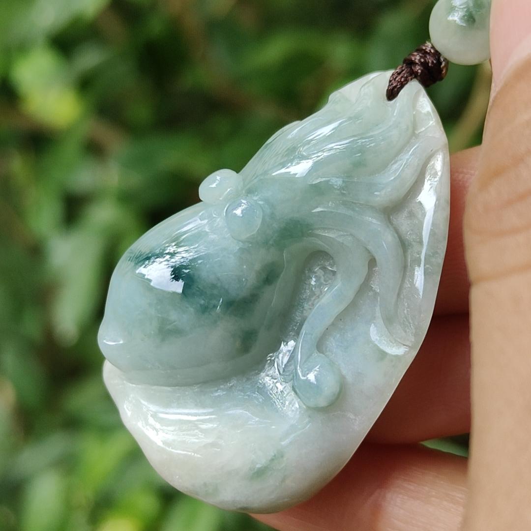Crafted as Octopus Pendant on Natural Type A Jadeite Jade with rough skin certificate weighs 20.48 grams, measurement 38.6 * 20.3 * 17 mm (pendant354) Yi Pin Qian Jadeites Jade Jewelry ~Your Precious Quintessential ~ Singapore