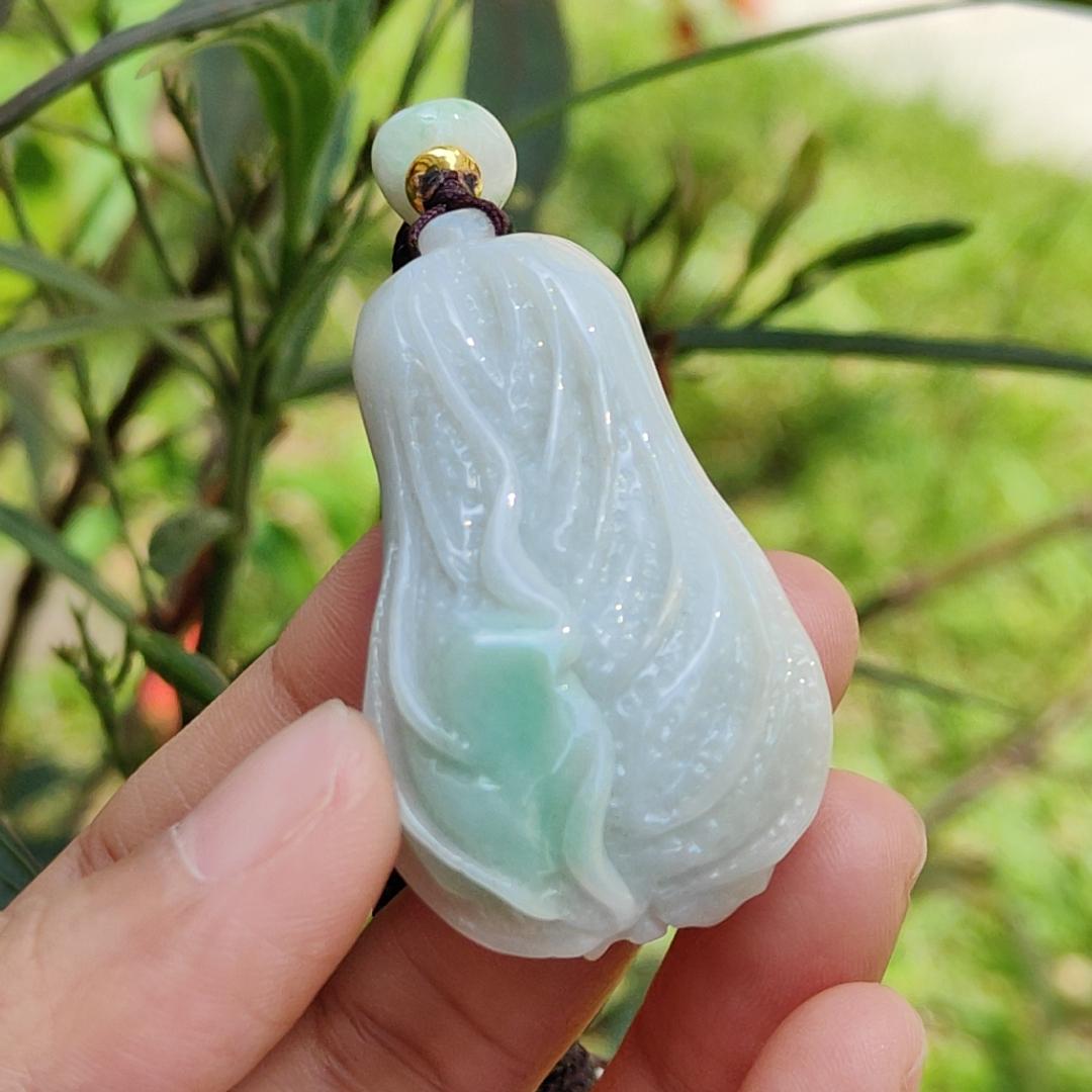 Crafted as Chinese cabbage with patches of light green Natural Type A Jadeite Pendant Necklace with QIC approved labs certificate weigh 31.92 grams, 46.8 * 27.3 * 18 mm, symbols of Boosts wealth, purity, and good weather, suitable for daily wear Yi Pin Qian