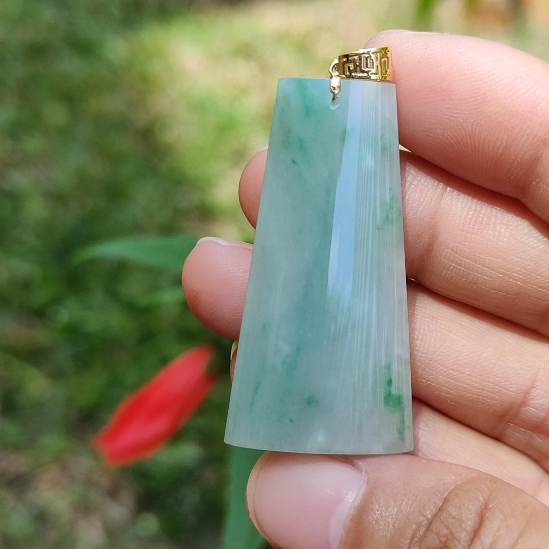 Light Green with Green Patches Natural Type A Jadeite Jade Crafted with Nothing as a pendant attached with 18k gold clasp, certificate weigh 11.24 grams, measurement 40.2 * 21 * 7.1 mm (18kp21) Yi Pin Qian