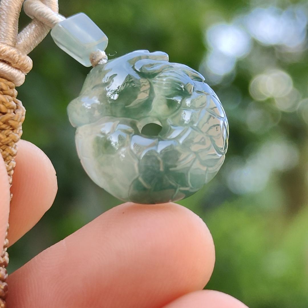 #Sold - High Quality Green with Green Patches Natural Type A Jadeite Jade crafted with shape of Donut with Baby Dragon as Pendant, QIC approved labs certificate weigh 4.11 grams, measurement 17.2 * 16.3 * 5.1 mm (pendant242)