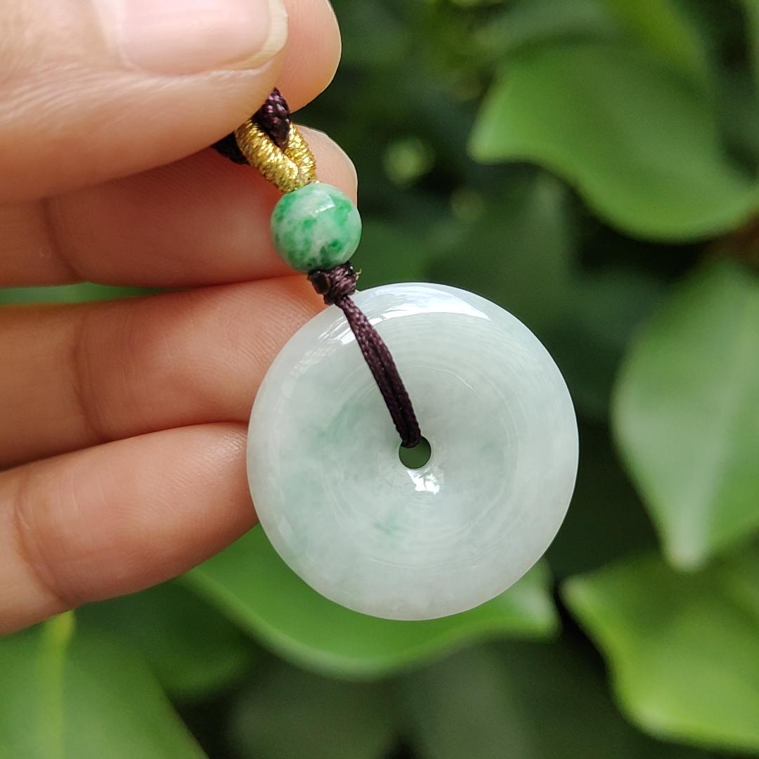 Light Green Hue with a Green Patch crafted as Donut Shape Natural Type A Jadeite-Jade Pendant, certificate weighs 5.61 grams, measurement 24.8 * 4.5 mm (pendant304) Yi Pin Qian Jadeites Jade Jewelry ~Your Precious Quintessential ~ Singapore