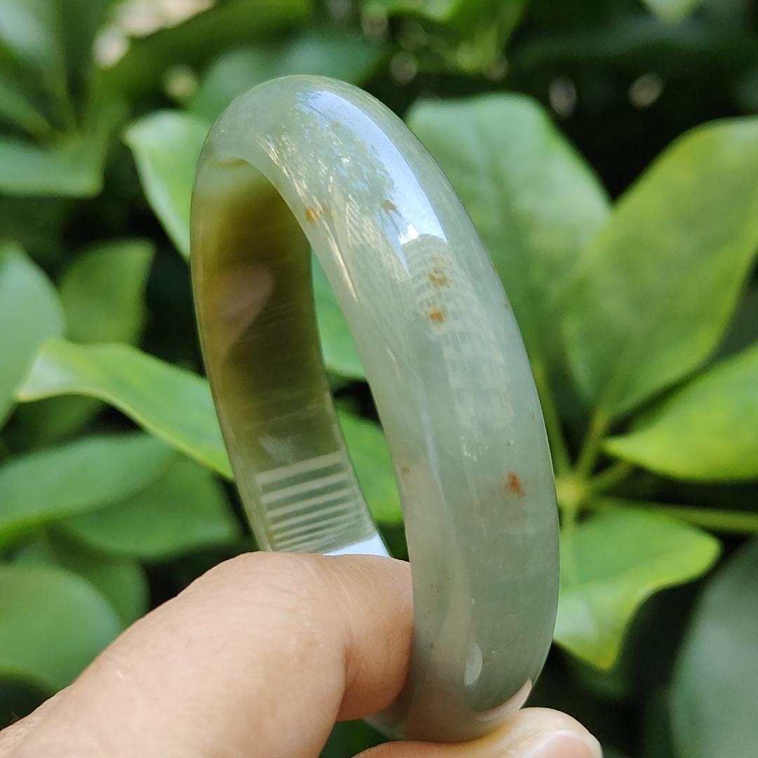 Crafted as Oval Shape bangle size 56 mm on Rare High Quality Natural Type A Jadeite Jade certificate weighs 46.53 grams, Width: 14.1 mm Thickness: 6.5 mm (bangle23) Yi Pin Qian Jadeites Jade Jewelry ~Your Precious Quintessential ~ Singapore