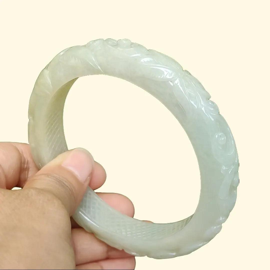 61.6 mm Crafted with patterns Peace Bangle Natural Type A Jadeite Jade certificate weighs 68.36 mm, Width 12.6 Thickness 9.6 mm (bangle24) Yi Pin Qian Jadeites Jade Jewelry ~Your Precious Quintessential ~ Singapore