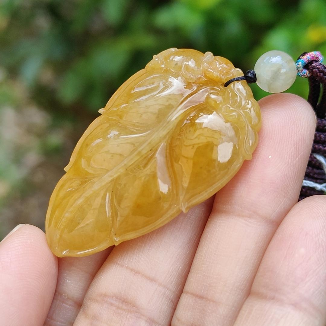 Very fine and old full Yellow Natural Type A Jadeite Pendant carved as a leave and a Mythical Beast on it with certificate weight 16.02 grams, 44 * 26 * 10 mm meaning Good luck and auspiciousness (pendant107) Yi Pin Qian