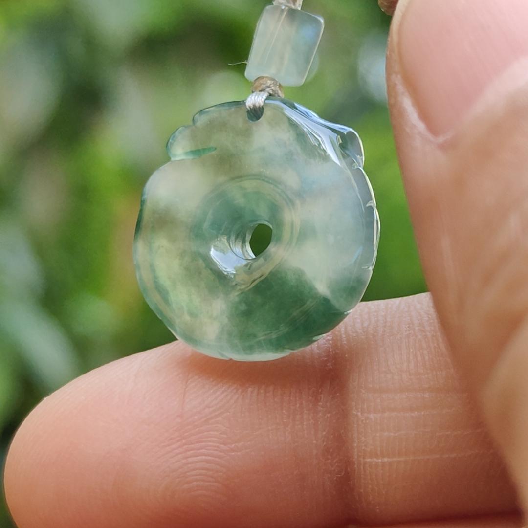 #Sold - High Quality Green with Green Patches Natural Type A Jadeite Jade crafted with shape of Donut with Baby Dragon as Pendant, QIC approved labs certificate weigh 4.11 grams, measurement 17.2 * 16.3 * 5.1 mm (pendant242)