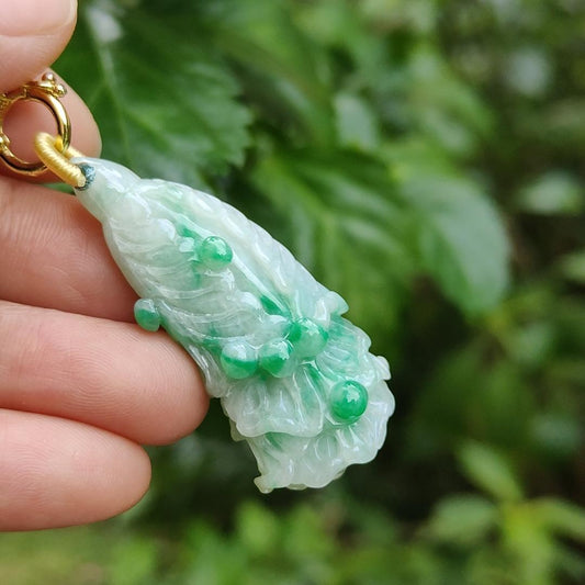 Rare Translucent Near White with Green Patches Natural Type A Jadeite pendant with NGI Gemstone report weight 72.19 grams, 44.87 * 20.83 * 14.52 mm carved as cabbage, with Gravity at 3.33 fine grain crystal aggregate suitable for daily wear (pendant127) Yi Pin Qian