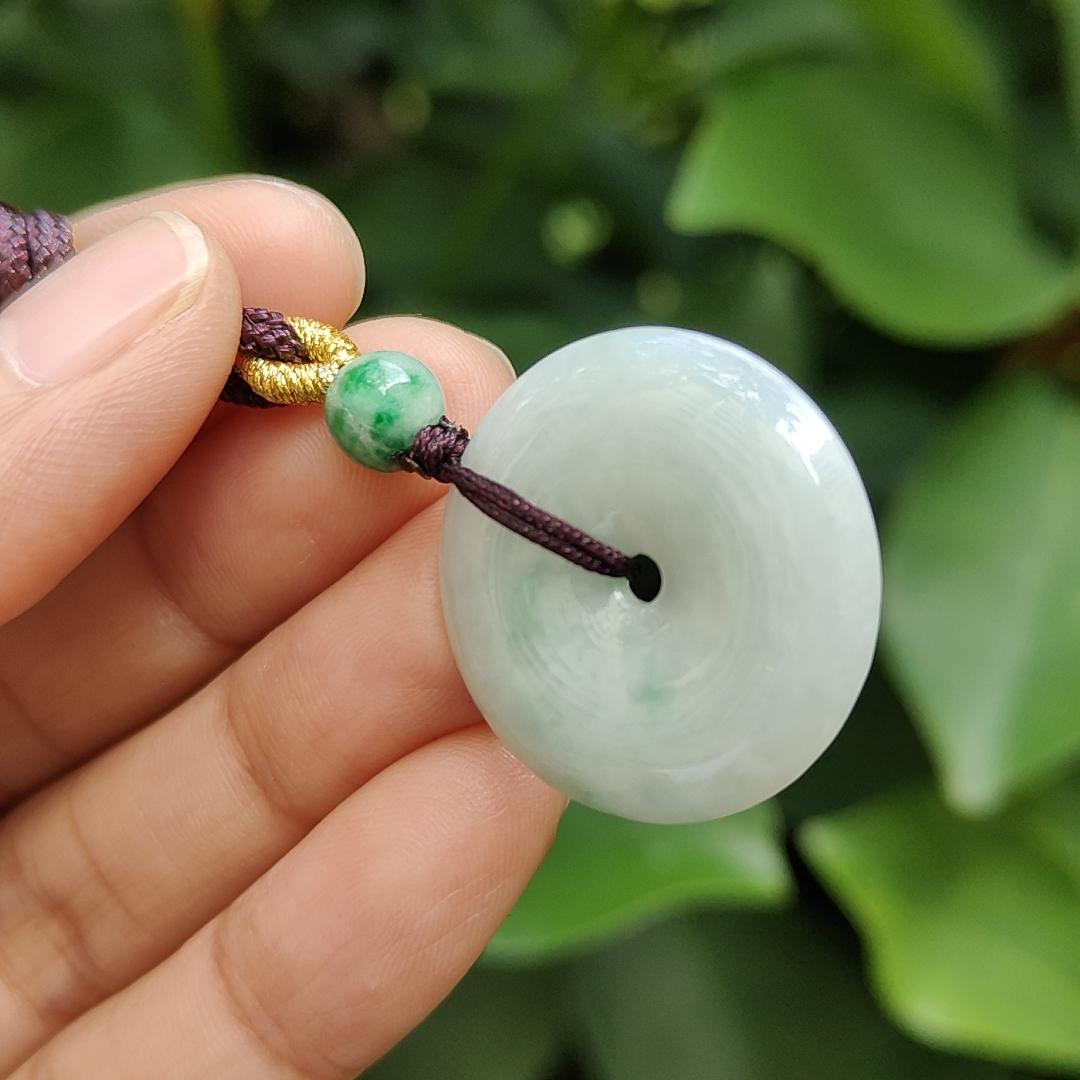 Light Green Hue with a Green Patch crafted as Donut Shape Natural Type A Jadeite-Jade Pendant, certificate weighs 5.61 grams, measurement 24.8 * 4.5 mm (pendant304) Yi Pin Qian Jadeites Jade Jewelry ~Your Precious Quintessential ~ Singapore