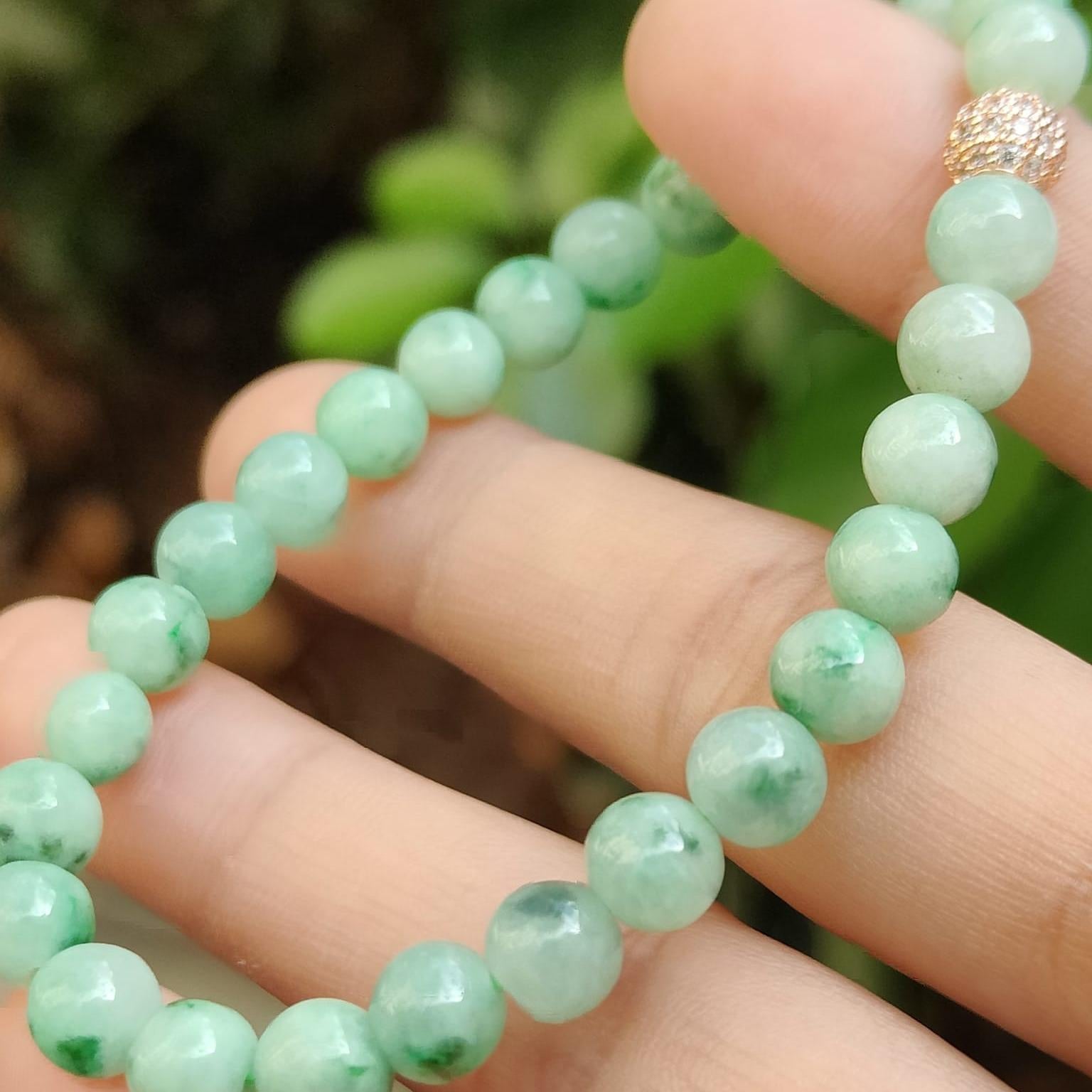 28 * 6.3 mm Light green with green patches beads Natural Type A Jadeite Jade bracelet, certificate weighs 12.64 grams (bracelet40) Yi Pin Qian Jadeites Jade Jewelry ~Your Precious Quintessential ~ Singapore