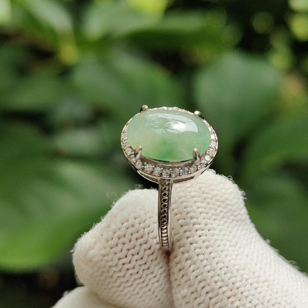 Crafted as Cabochon size 10.7 * 8 * 3mm on Light Green Natural Type-A Jadeite-Jade set with S925 adjustable as Ring, QIC approved Certificate weighs 2.25 grams (s925ring18) Yi Pin Qian Jadeites Jade Jewelry ~Your Precious Quintessential ~ Singapore