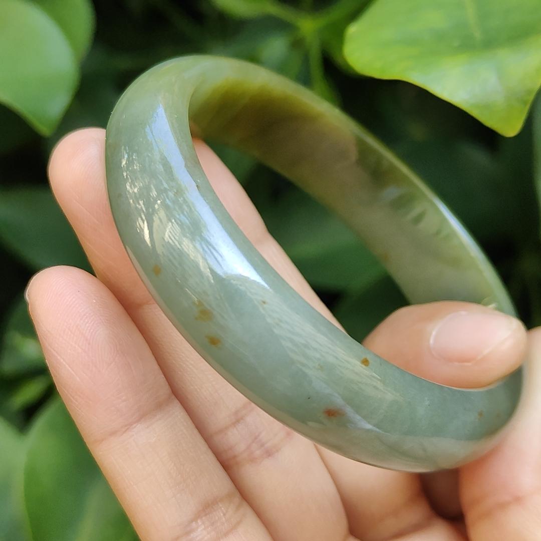 Crafted as Oval Shape bangle size 56 mm on Rare High Quality Natural Type A Jadeite Jade certificate weighs 46.53 grams, Width: 14.1 mm Thickness: 6.5 mm (bangle23) Yi Pin Qian Jadeites Jade Jewelry ~Your Precious Quintessential ~ Singapore