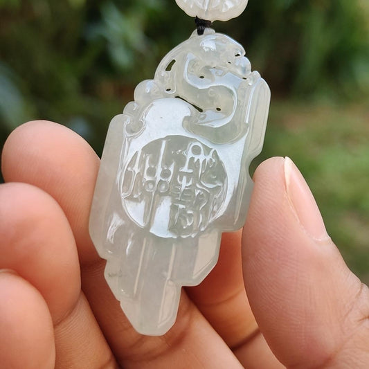 Icy Translucent Natural Type A Jadeite Jade beautifully crafted with old school dragon as pendant, certificate weighs 14.63 grams (pendant246) Yi Pin Qian
