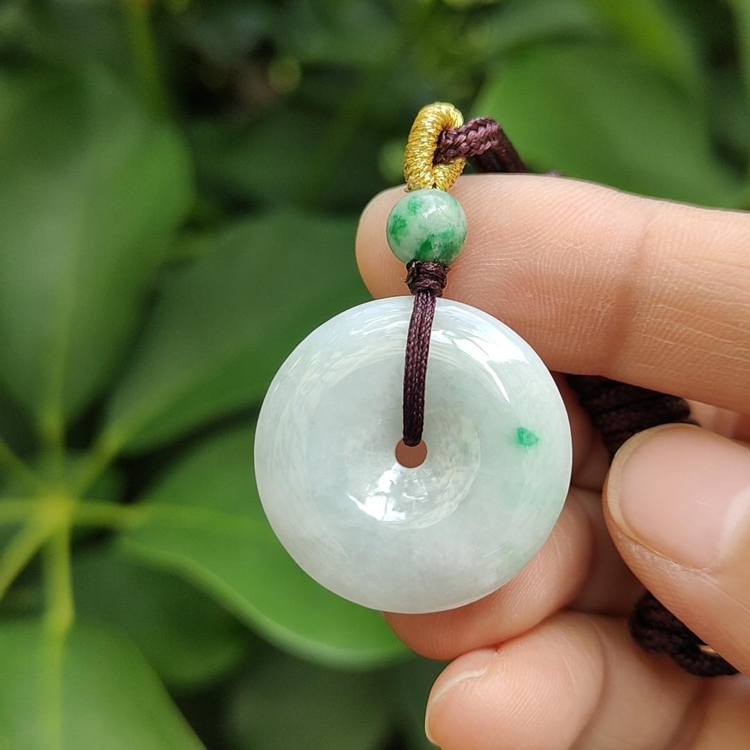 Light Green Hue with a Green Patch crafted as Donut Shape Natural Type A Jadeite-Jade Pendant, certificate weighs 5.61 grams, measurement 24.8 * 4.5 mm (pendant304) Yi Pin Qian Jadeites Jade Jewelry ~Your Precious Quintessential ~ Singapore