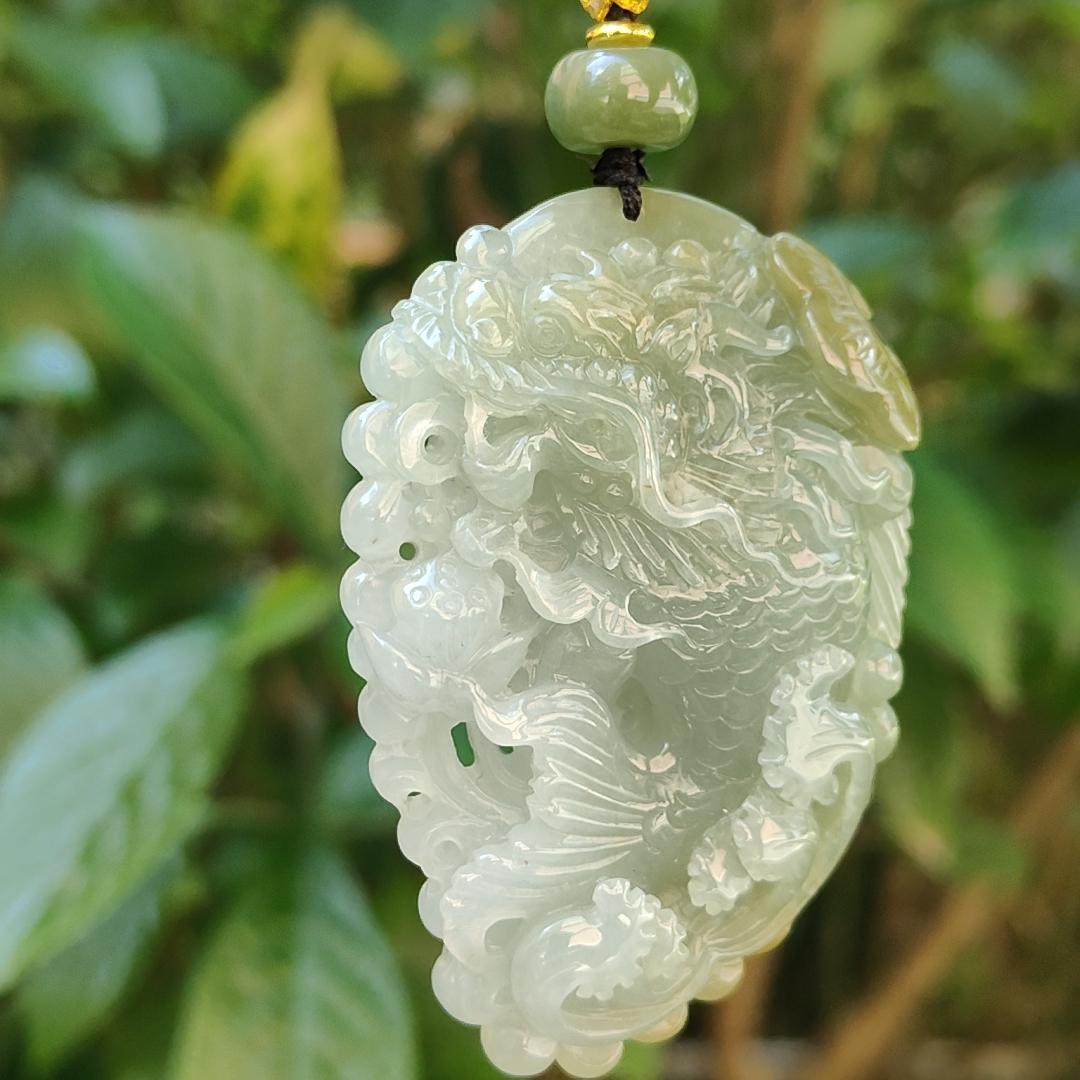 Tea Green Yellow Natural Type A Jadeite Pendant Carved as Dragon Head Fish Body meaning Prosperity, wealth and happiness with certificate weighs 49.67 grams, 62.60 * 43.50 * 12.10 mm (pendant93) Yi Pin Qian