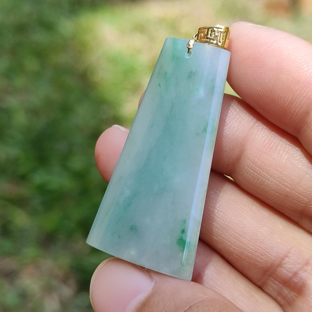 Light Green with Green Patches Natural Type A Jadeite Jade Crafted with Nothing as a pendant attached with 18k gold clasp, certificate weigh 11.24 grams, measurement 40.2 * 21 * 7.1 mm (18kp21) Yi Pin Qian