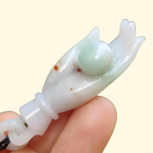 Light Green with Red patches Natural Type A Jadeite Jade crafted as Buddha Hand Pendant, QIC labs approved certificate weighs 15.32 grams, measurement 52.5 * 16 * 13.8 mm (pendant255) Yi Pin Qian