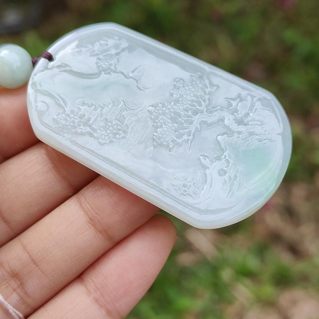 Quality Semi Icy White and Light Green Patches Natural Type A Jadeite Jade crafted with sceneries as pendant with QIC labs approved certificate weigh 24.89 grams, measurement 54 * 32 * 4.5 mm (pendant227) Yi Pin Qian