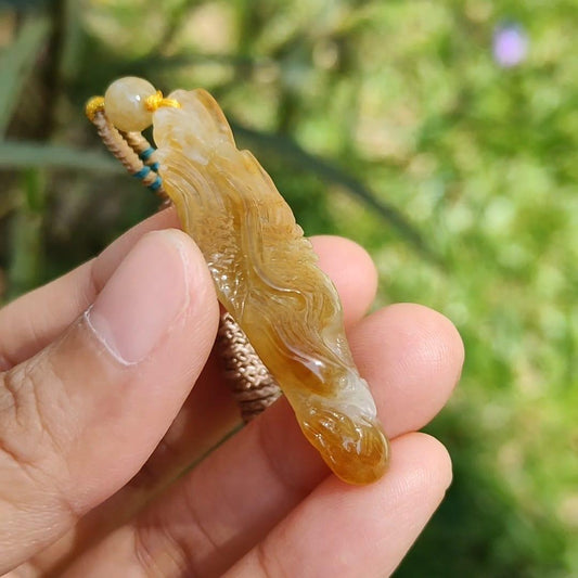 Yellow Natural Type A Jadeite crafted with Eagle and Chinese Coins symbols of Winner, Money and Luck, with QIC labs Approved certificate weigh 8.21 grams, 49.8 * 15.5 * 8.1 mm, very suitable for daily wear Yi Pin Qian
