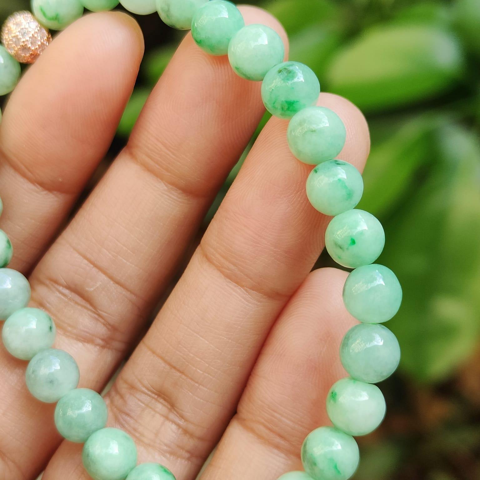 28 * 6.3 mm Light green with green patches beads Natural Type A Jadeite Jade bracelet, certificate weighs 12.64 grams (bracelet40) Yi Pin Qian Jadeites Jade Jewelry ~Your Precious Quintessential ~ Singapore
