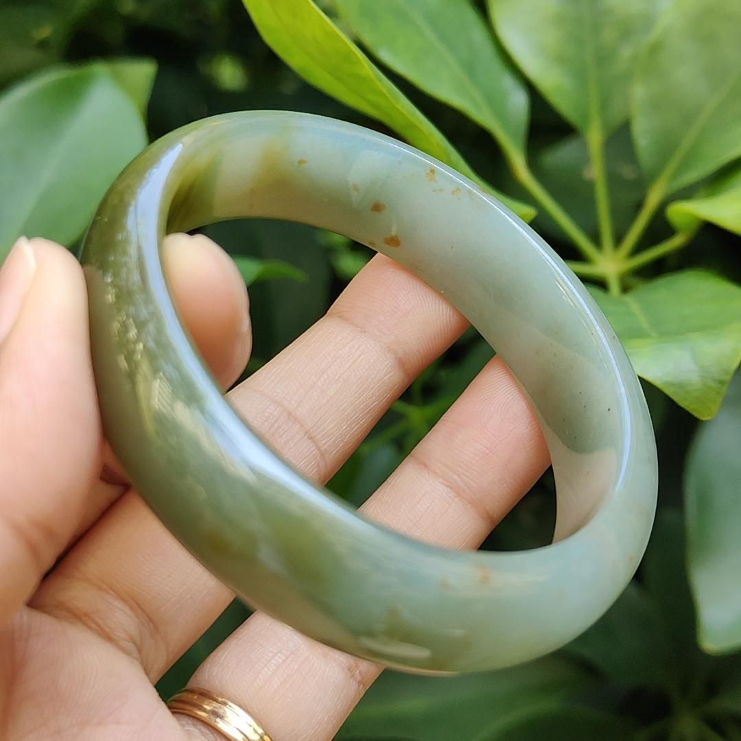 Crafted as Oval Shape bangle size 56 mm on Rare High Quality Natural Type A Jadeite Jade certificate weighs 46.53 grams, Width: 14.1 mm Thickness: 6.5 mm (bangle23) Yi Pin Qian Jadeites Jade Jewelry ~Your Precious Quintessential ~ Singapore