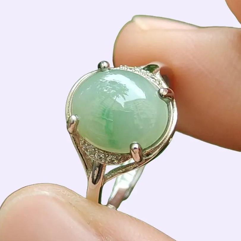 Crafted as Light Green Cabochon on Natural Type A Jadeite Jade set with S925 as Adjustable Ring certificate weighs 2.22 grams, measurement 10.3 * 8.9 * 3.4 mm (s924ring24) Yi Pin Qian Jadeites Jade Jewelry ~Your Precious Quintessential ~ Singapore