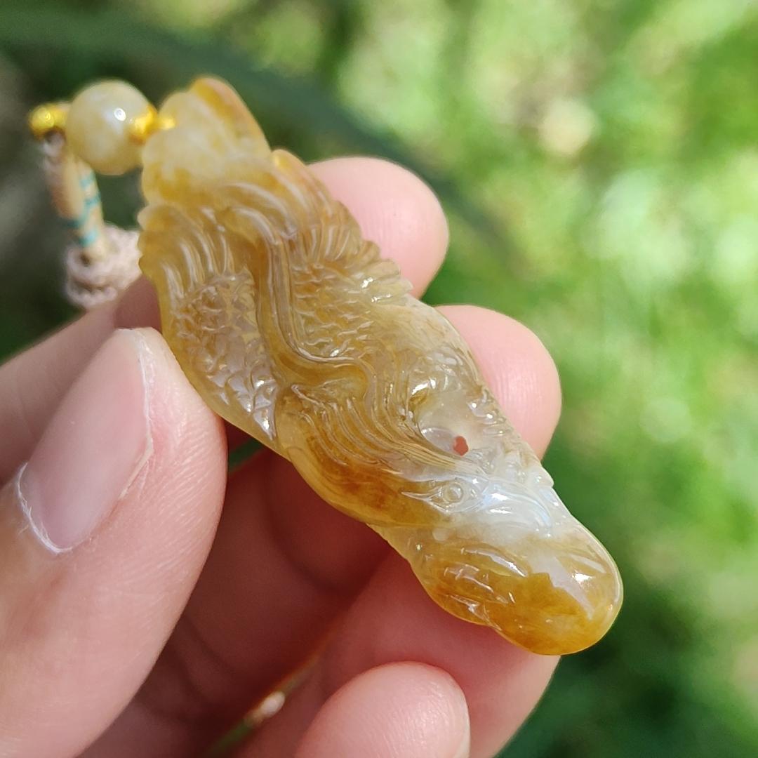 Yellow Natural Type A Jadeite crafted with Eagle and Chinese Coins symbols of Winner, Money and Luck, with QIC labs Approved certificate weigh 8.21 grams, 49.8 * 15.5 * 8.1 mm, very suitable for daily wear Yi Pin Qian