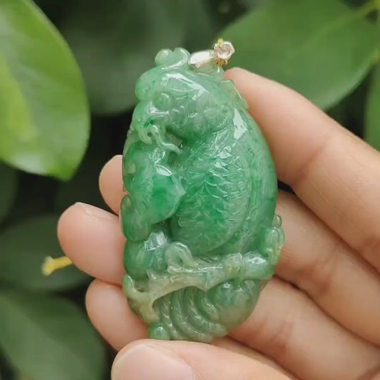 Green Natural Type A Jadeite Jade crafted with Parrot with Ruyi and Coin as Pendant, ceritificate weighs 22.55 grams, measurement 54.6 * 30 * 9.2 mm (pendant332)