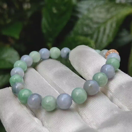薰衣草和绿色天然 A 型翡翠 23 珠手链，附有 QIC 认可实验室证书，重 19.03 克，7.8 毫米（手链 11）