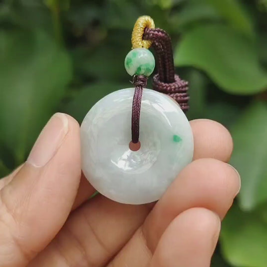 Light Green Hue with a Green Patch crafted as Donut Shape Natural Type A Jadeite-Jade Pendant, certificate weighs 5.61 grams, measurement 24.8 * 4.5 mm (pendant304)